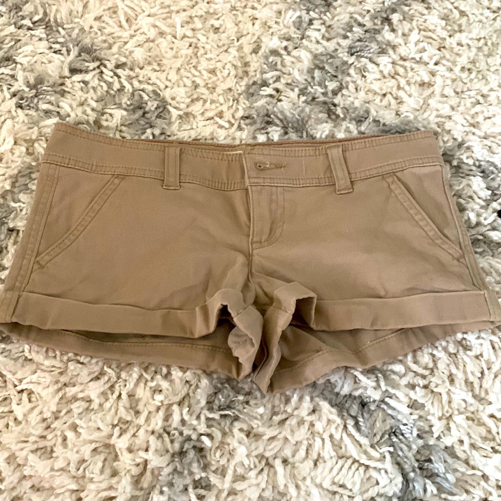 Khaki colored short shorts